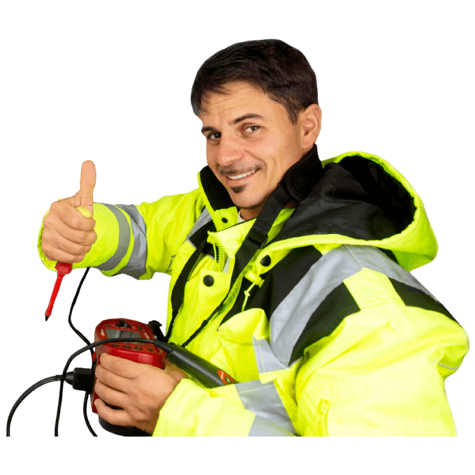 Electrician wearing a high vis jacket using a multifunction tester.