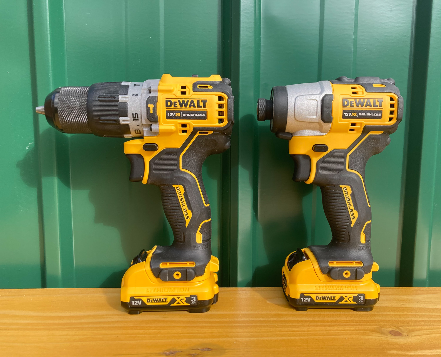 Drill and impact driver on a workbench ready for sale.